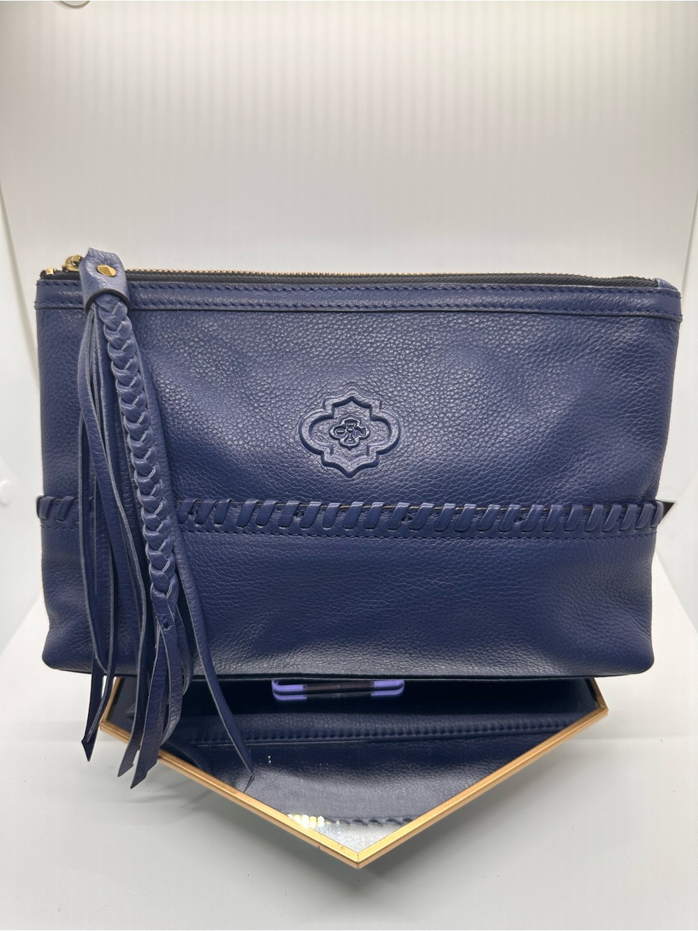 orYANY Navy Leather Tassel Clutch